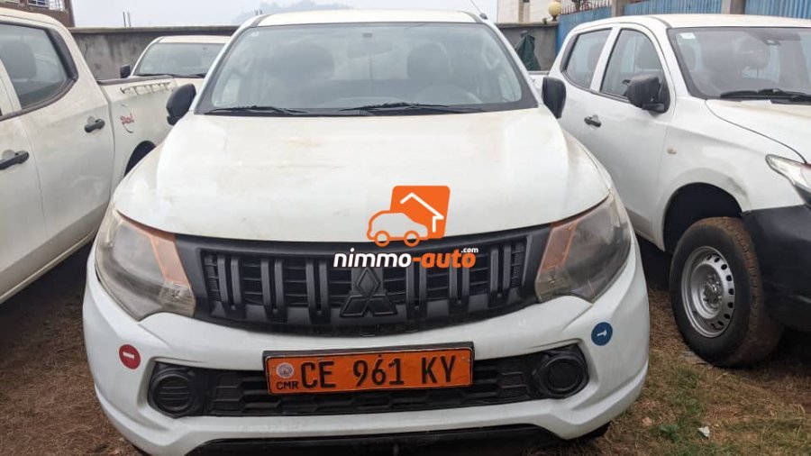 Pick up de marque Mitsubishi à l'état neuf parfait pour tout déplacement en dehors et à l'intérieur de la ville de Yaoundé