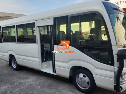 Coaster climatisé nouveau modèle à louer à Douala